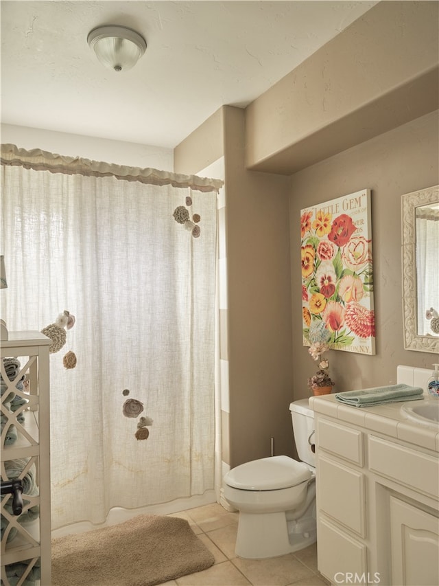 full bathroom featuring vanity, toilet, shower / bathtub combination with curtain, and tile patterned floors