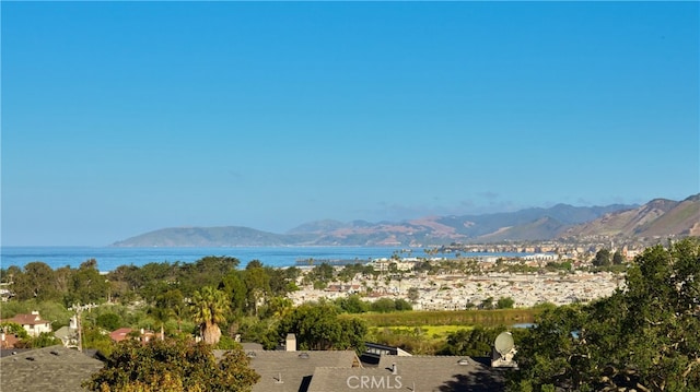 view of mountain feature with a water view