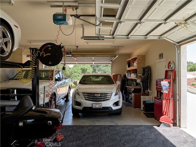 garage featuring a garage door opener