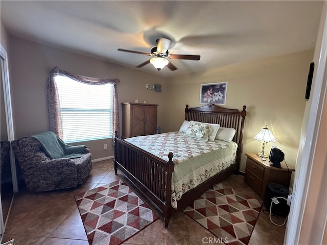 bedroom featuring ceiling fan and tile patterned floors