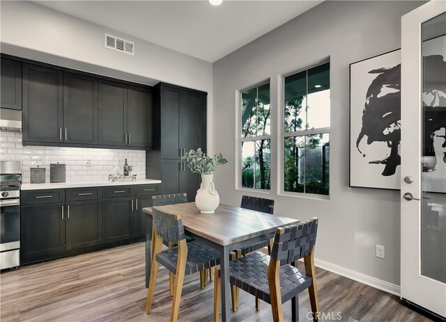 dining room with light hardwood / wood-style flooring