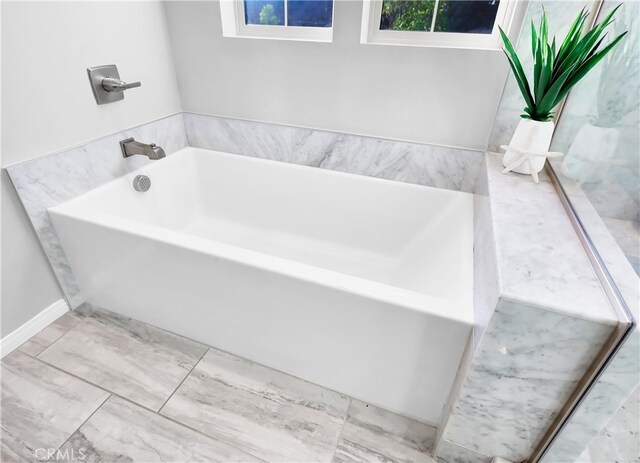 bathroom featuring a bathing tub