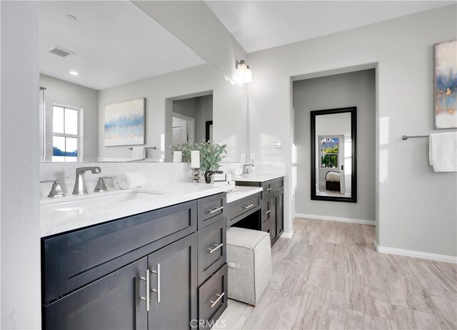 bathroom featuring vanity