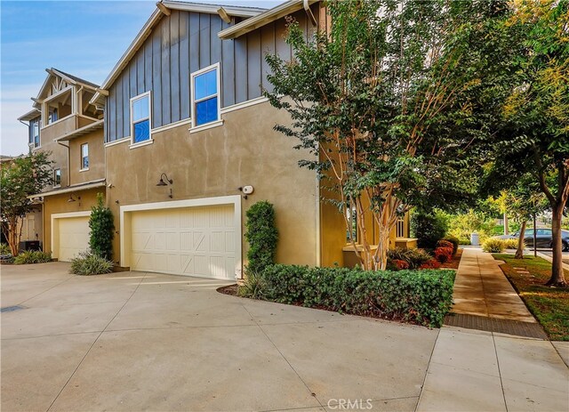 view of property exterior featuring a garage