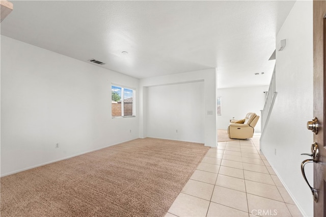 empty room featuring light tile patterned floors