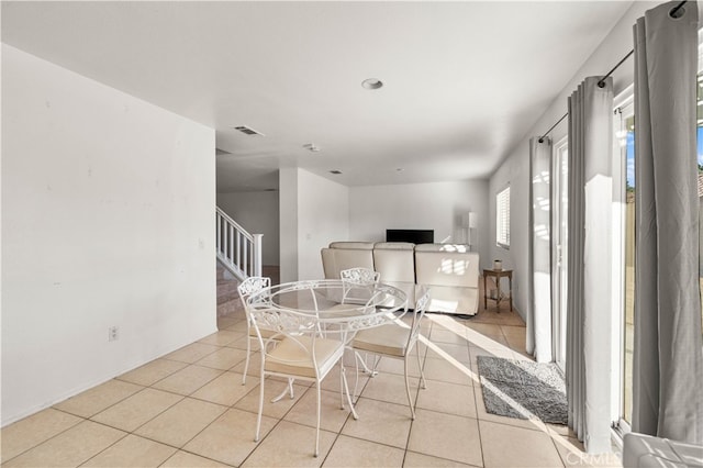 view of tiled dining space