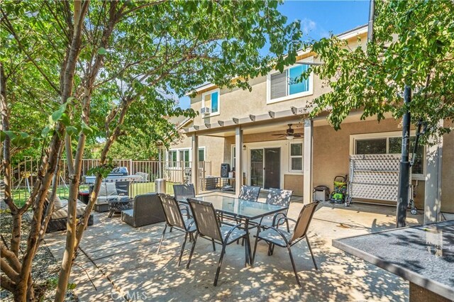 view of patio / terrace featuring ceiling fan