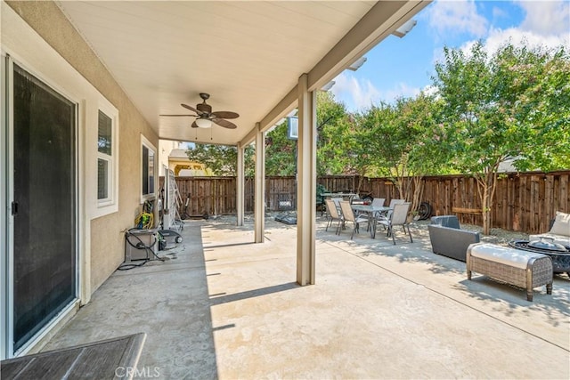 view of patio featuring ceiling fan