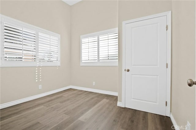 spare room featuring hardwood / wood-style floors