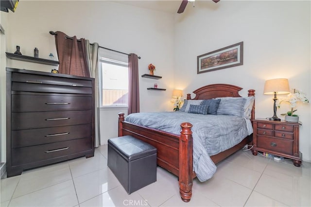 bedroom featuring ceiling fan and light tile patterned flooring