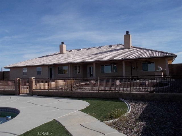 rear view of house with a patio area