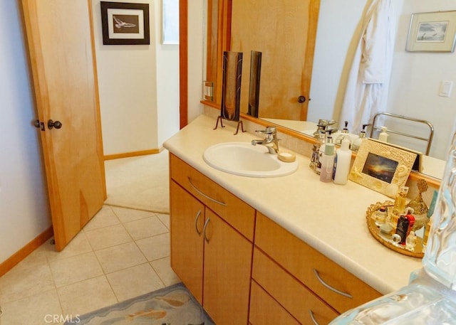 bathroom featuring tile patterned floors and vanity