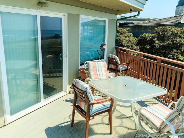 wooden balcony with a wooden deck