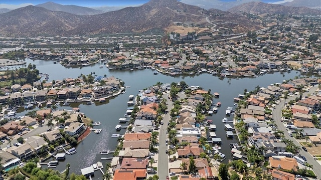 bird's eye view with a water and mountain view