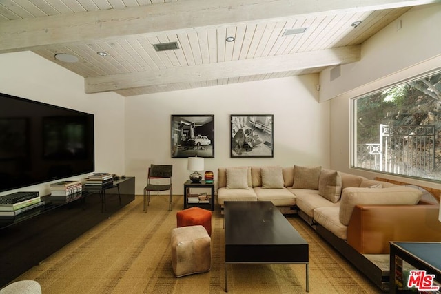 living room with vaulted ceiling with beams and wooden ceiling