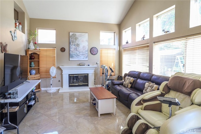 living room featuring high vaulted ceiling