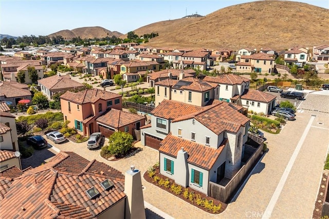 drone / aerial view with a mountain view and a residential view