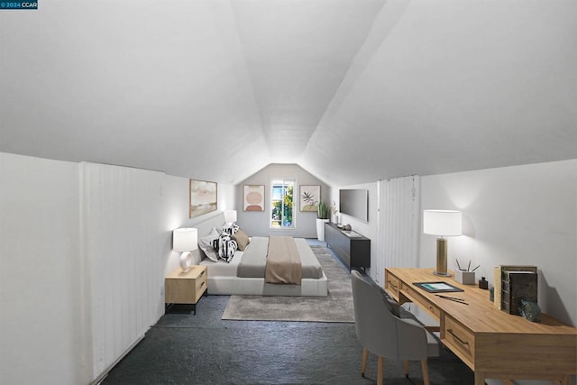 bedroom featuring vaulted ceiling and dark colored carpet