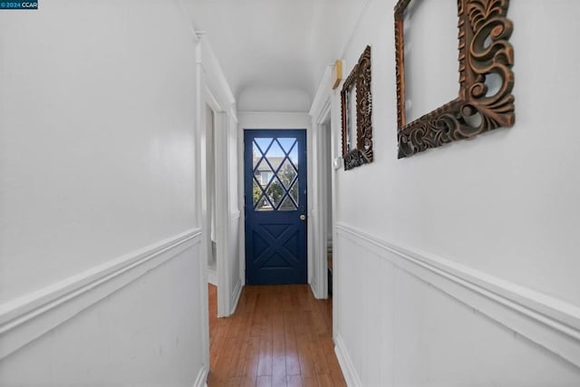 doorway to outside featuring hardwood / wood-style flooring