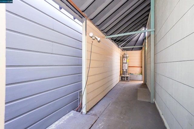 view of side of property featuring gas water heater