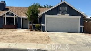 single story home with a garage