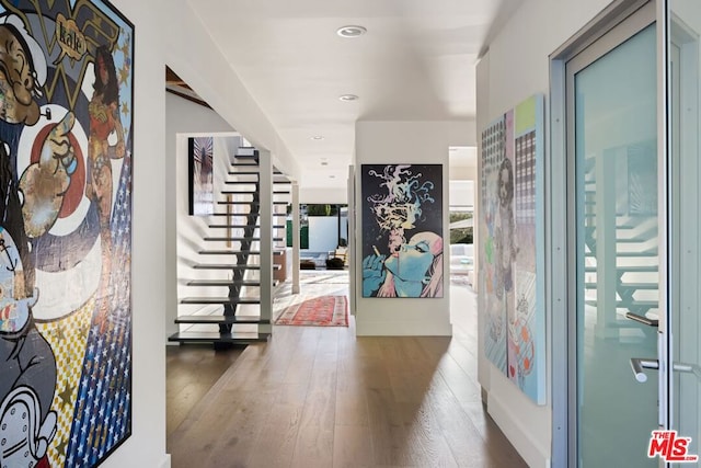 entrance foyer with hardwood / wood-style floors