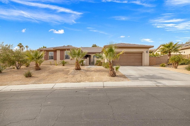 ranch-style home featuring a garage