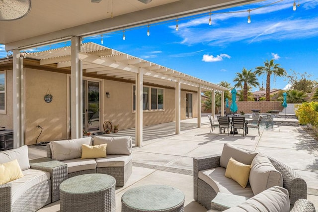 view of patio featuring an outdoor living space, a pergola, and ceiling fan