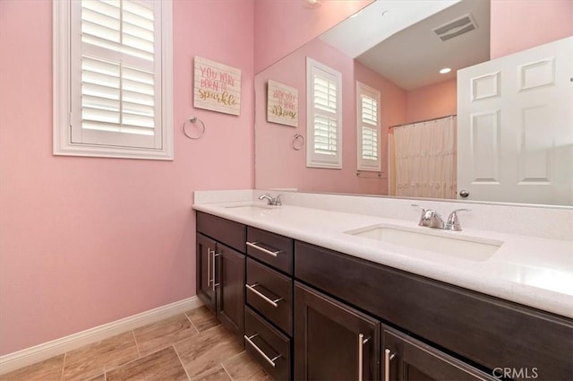 bathroom featuring vanity