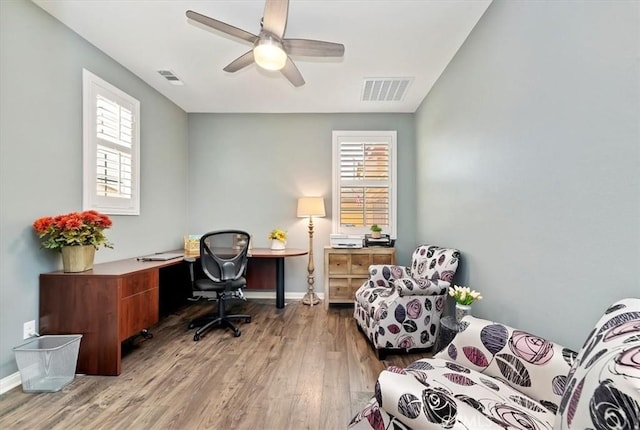 office area with hardwood / wood-style flooring and ceiling fan