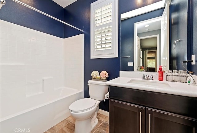 full bathroom with toilet, tile patterned flooring, plenty of natural light, and shower / washtub combination