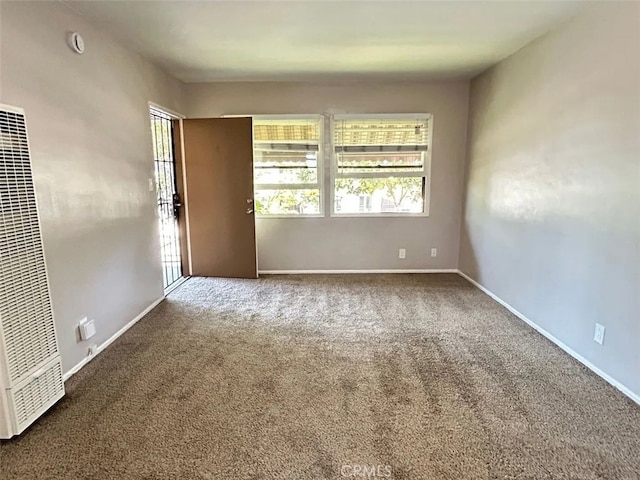 spare room with carpet