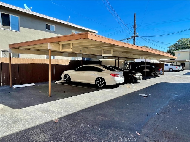 view of car parking featuring a carport