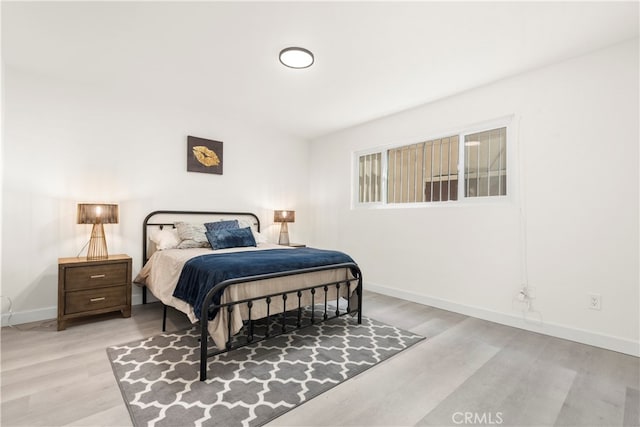 bedroom featuring light hardwood / wood-style floors