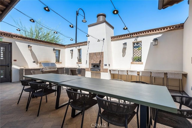 view of patio with area for grilling and grilling area