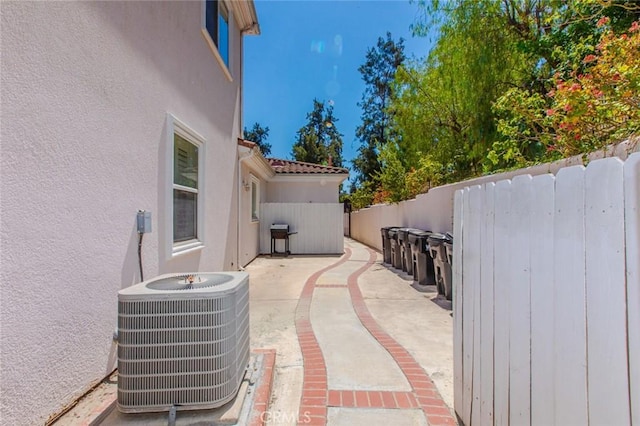 view of patio with cooling unit