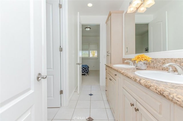 bathroom featuring tile patterned floors and vanity