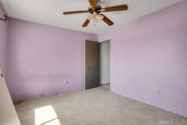 spare room featuring ceiling fan