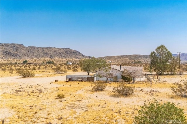 view of mountain feature with a rural view