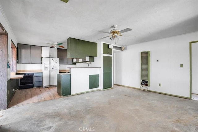 kitchen featuring white refrigerator with ice dispenser and ceiling fan