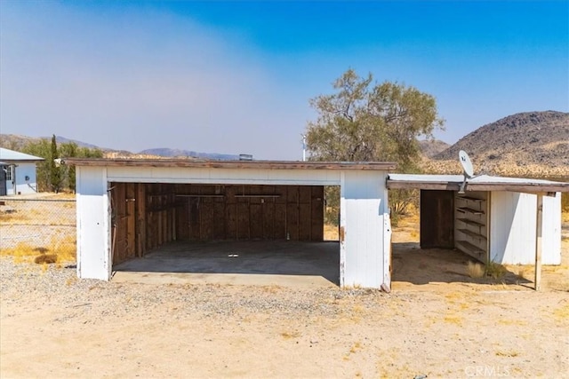 garage featuring a mountain view