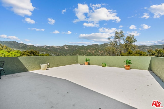 view of patio featuring a mountain view