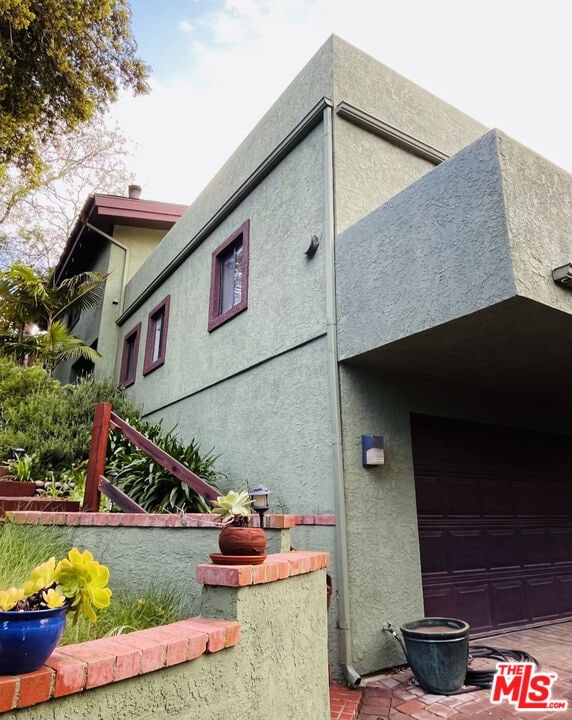 view of home's exterior with a garage