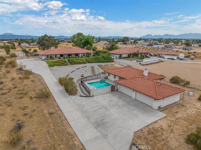 drone / aerial view featuring a mountain view