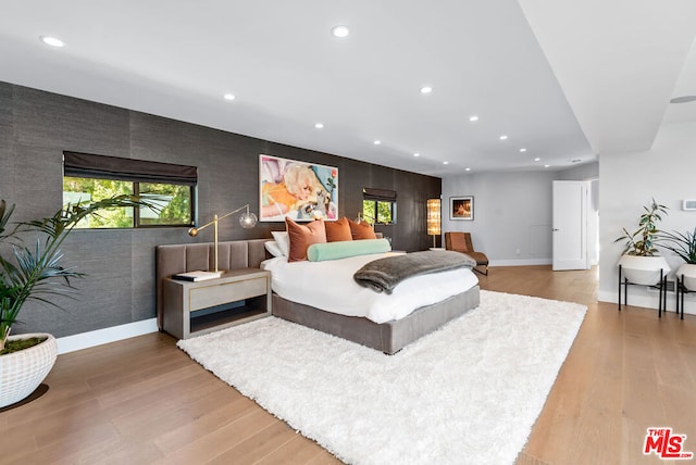 bedroom featuring wood-type flooring