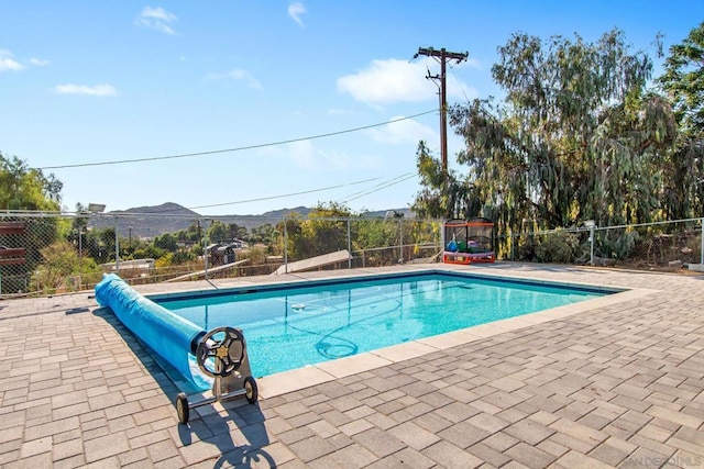 view of pool featuring a mountain view