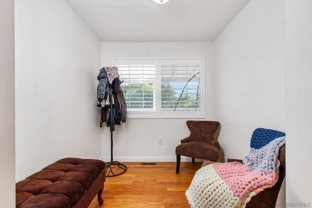 living area with wood-type flooring