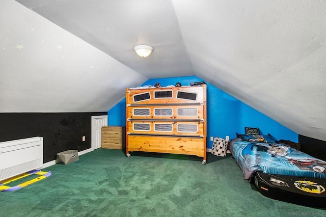 bonus room with vaulted ceiling and dark colored carpet