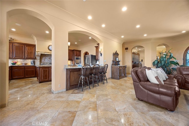 living room with crown molding