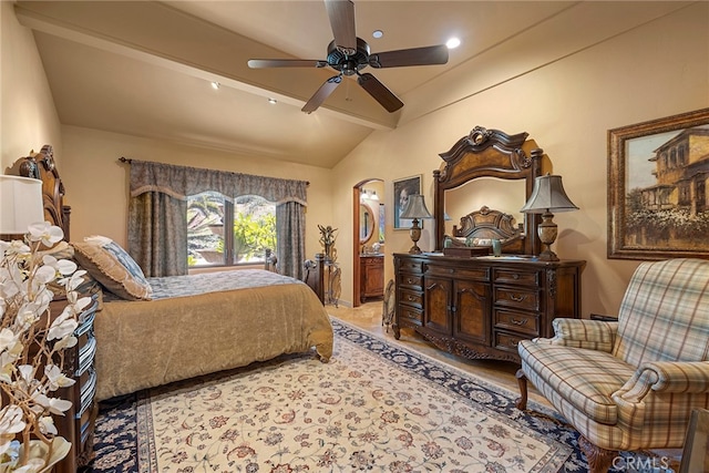 bedroom featuring lofted ceiling with beams, ceiling fan, and light colored carpet